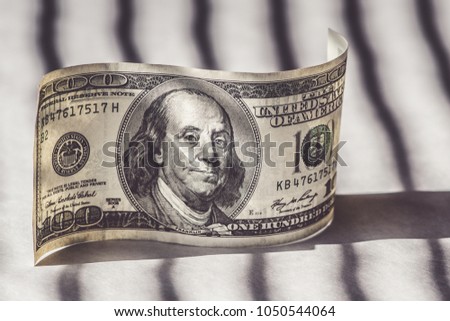 100 dollar bill with President Benjamin Franklin. The United States one hundred-dollar bill
