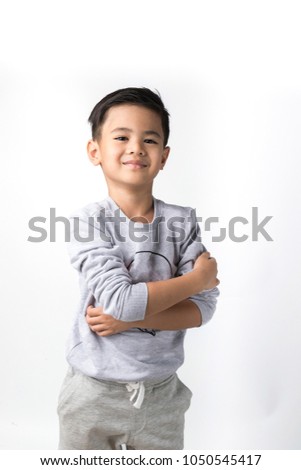 portrait of a smart and handsome boy on nice isolated white background.