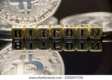 silver bitcoins, bitcoin words and reflections