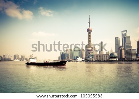 a cargo ship in the huangpu river,shanghai,China