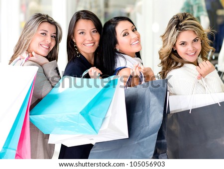 Happy group of girls at the shopping center