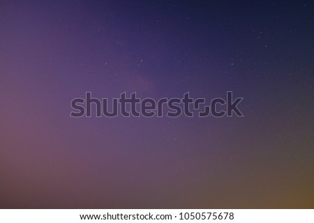 The sky background with stars in the night before morning.Over exposed