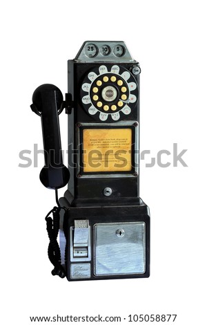An vintage pay phone isolated on white background with clipping path Royalty-Free Stock Photo #105058877