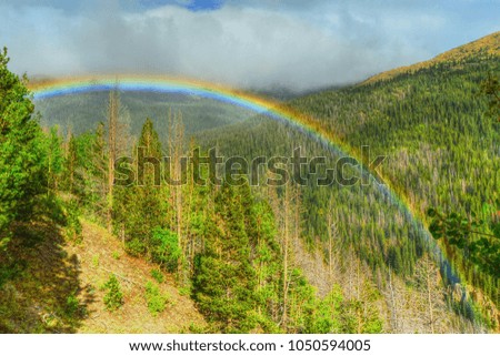 Rainbow over Rocky Mountain National Park, Colorado