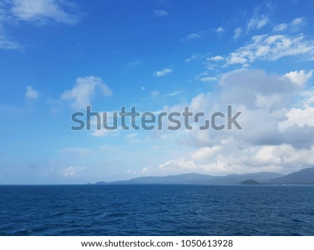 Photo of sea coast and cloudy sky