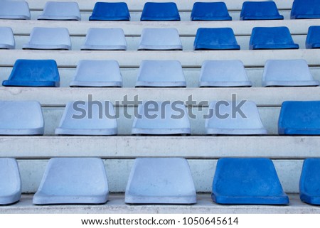 Small stadium seats in blue different angles