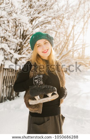 girl with skates smiling. What a great day