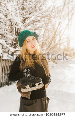 girl with skates smiling
