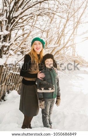 girl and boy smiling in a beautiful day
