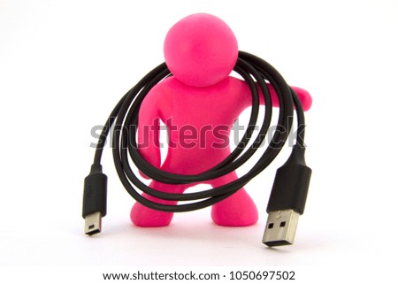 Pink plasticine character and mini USB 2.0 adapter. Data charger cable. Isolated on white background