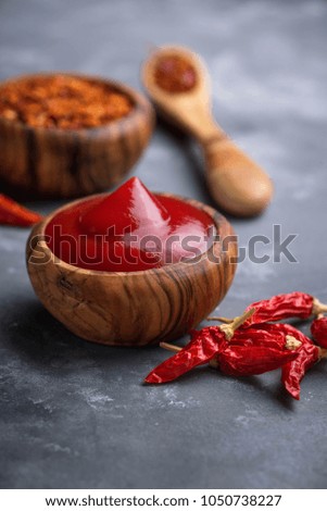 Chili sauce with dried peppers. Selective focus