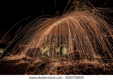 The burning steel wool on a tractor with some hot glowing shower spark make some great effect such as line of light or fireworks.
