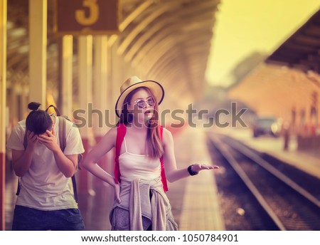 Unhappy traveler showing frustration and shock with miss a train.