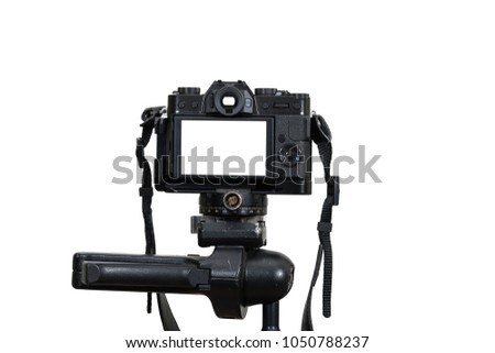 A Professional digital mirrorless camera on tripod on white background, Camera for photographer or Video, Live Streaming equipment concept Royalty-Free Stock Photo #1050788237