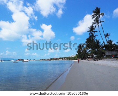 
Beautiful   sand beach and tropical sea in blue sky BO PHUT beach SAMUI ISLAND THAILAND