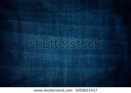 blue jean texture   with empty space  and vignette  abstract fashion background