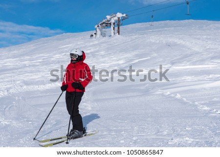 Woman downhill skiing in Lapland Finland