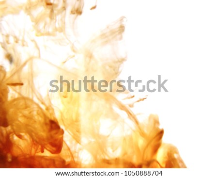 Green and orange colored ink spreading in the water  , Colorful Blur smoke on white background , Smooth surface and pattern