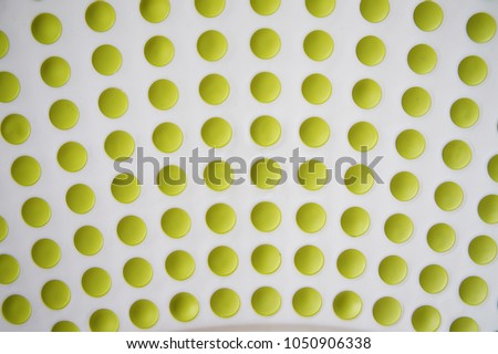 green circles are laid out in the line on a white background. pimply Royalty-Free Stock Photo #1050906338