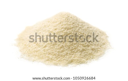Pile of semolina flour isolated on white Royalty-Free Stock Photo #1050926684