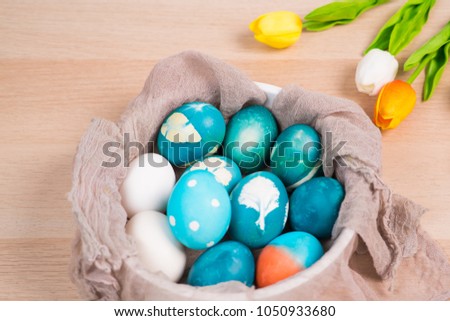 Happy Easter Sunday organic blue Easter eggs with white color eggs wait for painting Easter holiday decorations Easter concept backgrounds with copy space