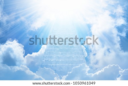 Beautiful religious background - stairs to heaven, bright light from heaven, stairway leading up to skies Royalty-Free Stock Photo #1050961049