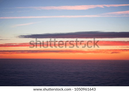 Sunset with flat clouds