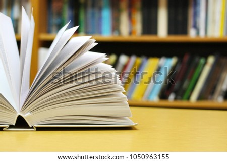 Opened book on table
