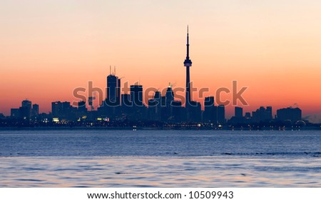 Toronto skyline with CN Tower and the financial district at sunrise