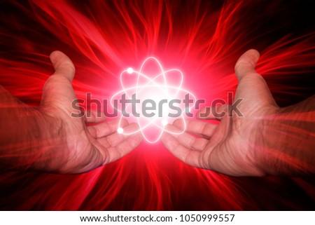 Hands with a molecule and its energy Royalty-Free Stock Photo #1050999557