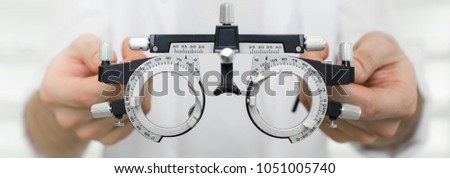 test vision equipment, optometrist trial frame close-up Royalty-Free Stock Photo #1051005740