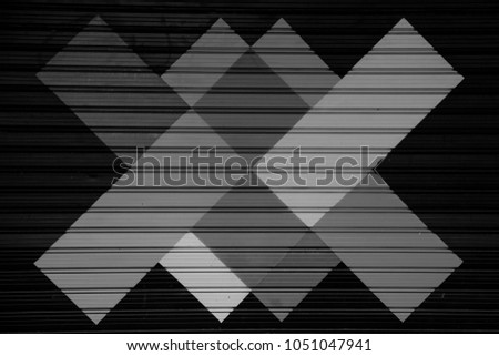black and white Abstract multicolored geometric pattern on a black background.