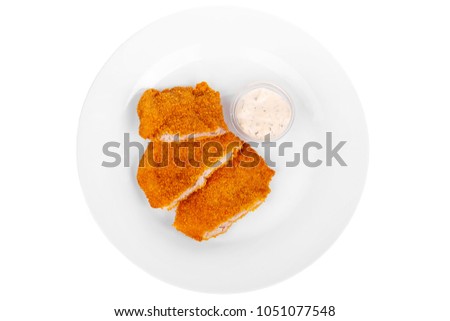 Schnitzel is cut into pieces of chicken, pork, meat, grilled, barbecue, isolated white background. Tartar, sour cream, mayonnaise, white sauce. For the menu in the restaurant, bar View from above Royalty-Free Stock Photo #1051077548