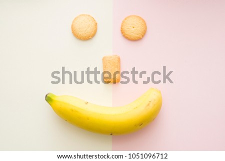 cookie and banana face lay out in happy design concept in pastel mood and tone