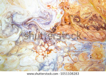 Multicolored abstract background. Milk, food color, soap
