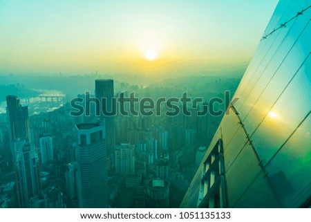 The skyscraper glass under the setting sun