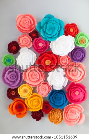 Colorful handmade paper flowers on isolated background for wedding invitation or gift card. 