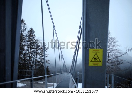 Attention icon on a bridge 