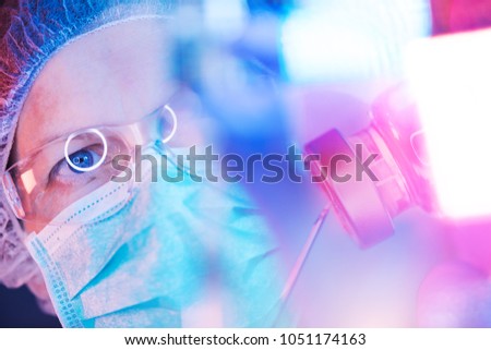 Pharmacology science researcher working in laboratory on development of new immunology vaccine Royalty-Free Stock Photo #1051174163