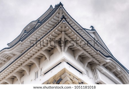 It is a picture taken by HDR method of Himeji Castle on a rainy day.