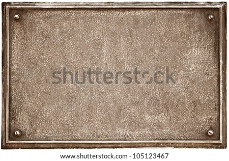 Old cast-iron plaque on the wall. Empty metal frame for sign Royalty-Free Stock Photo #105123467
