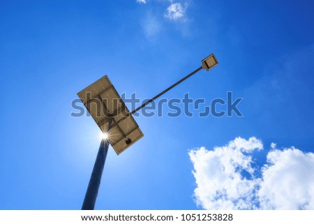 Solar powered street light with blue sky background
