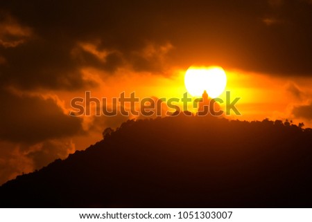 Silhouette buddha sunset landscape 