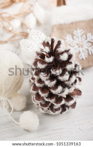 Christmas decoration, pine cone, toys on white background. 