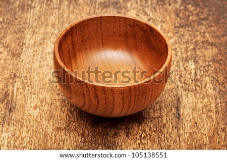 manufactured wooden bowl empty. kitchen utensil