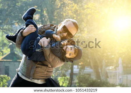 Mother and son having fun in the park
