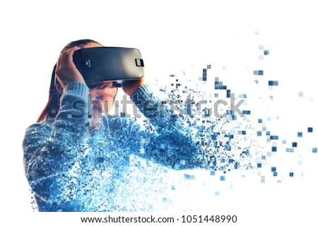 A person in virtual glasses flies to pixels. The woman with glasses of virtual reality. Future technology concept. Modern imaging technology. Fragmented by pixels.