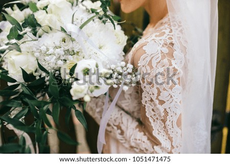 Gorgeous bride with luxury wedding bouquet