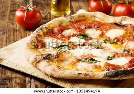 Traditional Neapolitan Pizza Royalty-Free Stock Photo #1051494194