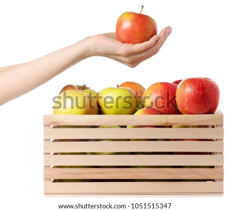 A box of apples in female hand on a white background isolation